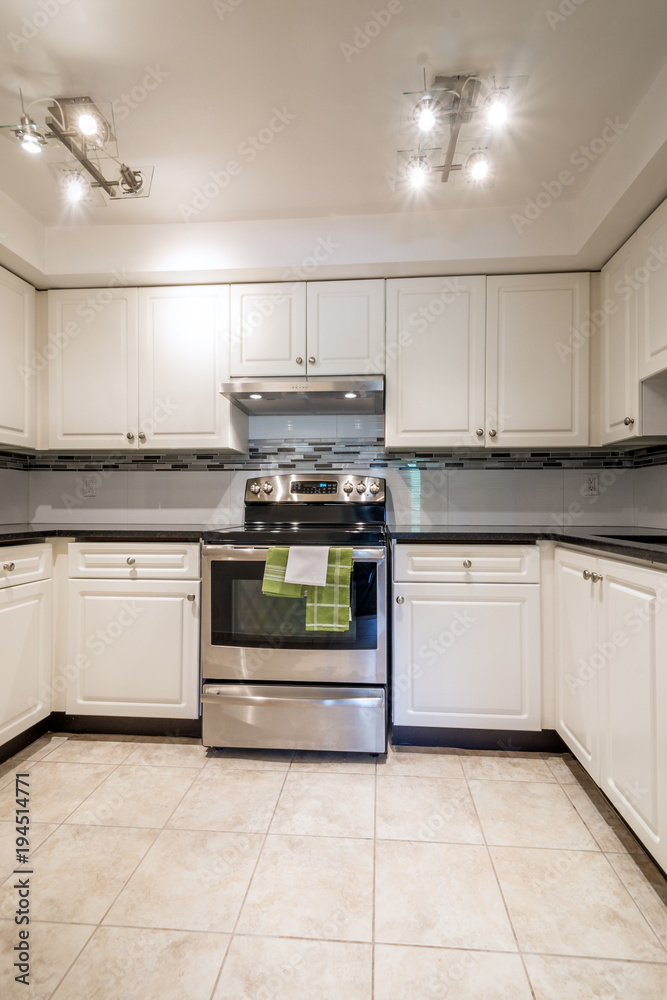 Modern kitchen interior with stainless steel appliances. Modern kitchen interior with stainless steel appliances.