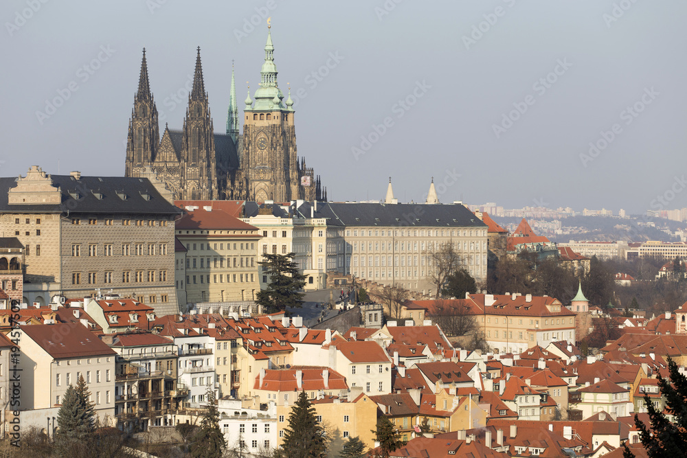Obraz premium Sunny freezy winter Prague City with gothic Castle, Czech Republic