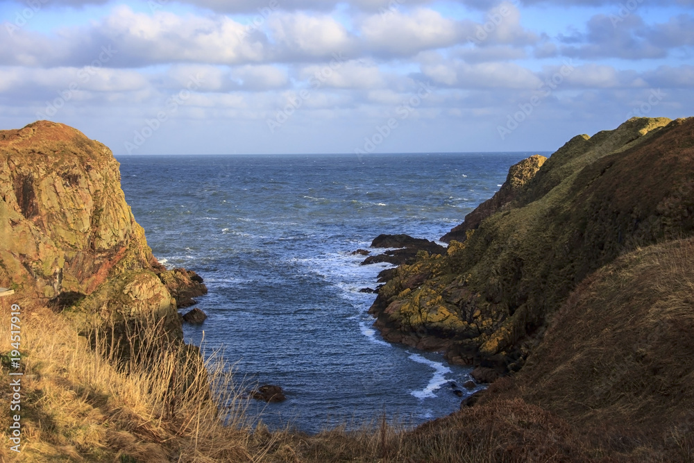 Beautiful landscape. Rocks, cliffs and the sea. Longhaven, Peterhead, Scotland, United Kingdom. February 2018