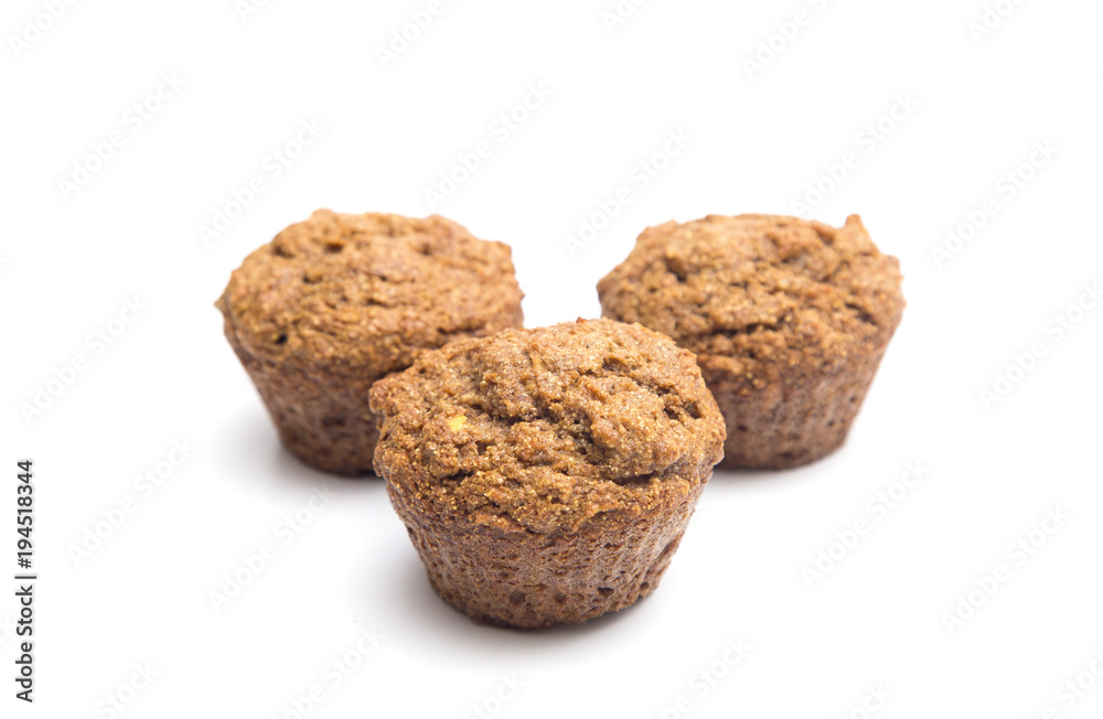Apple Cinnamon Pecan Muffins on a White Background Apple Cinnamon Pecan Muffins on a White Background