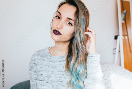 Portrait of pretty woman with dyed hair