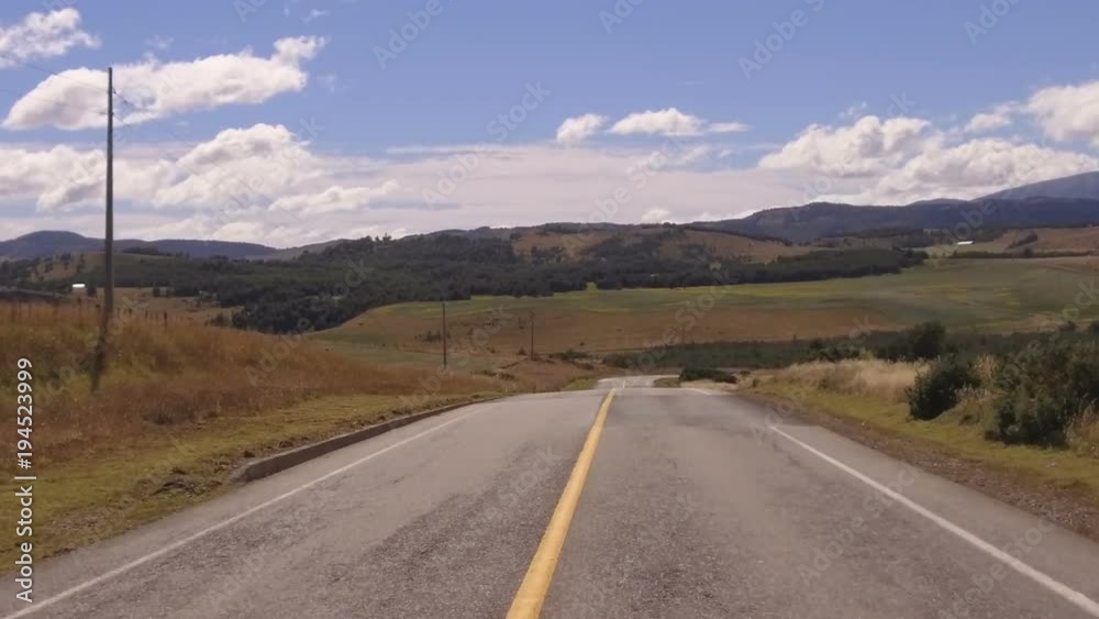 Driving Plate. Car on a Country Road, mountain range, valley - POV - Point of view front - windshield. Day. Driving Plate. Car on a Country Road, mountain range, valley - POV - Point of view front - windshield. Day.