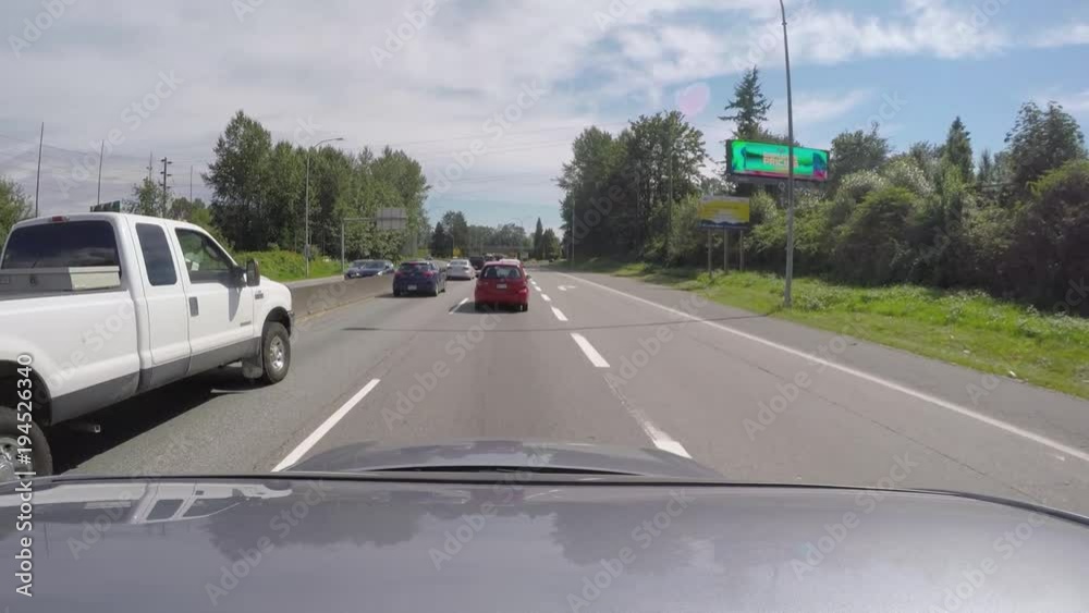 British Columbia, Canada. July 2017. Mounted shot of car driving along the Sea to Sky highway in North Vancouver British Columbia, Canada. July 2017. Mounted shot of car driving along the Sea to Sky highway in North Vancouver