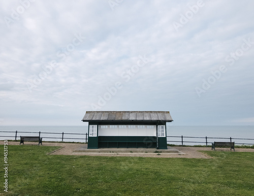 Shelter on the promenade at Mundesley, Norfolk, UK. photo
