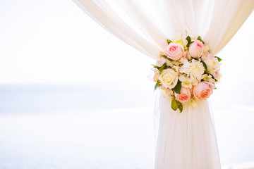 Flowers wedding ceremony by the sea.