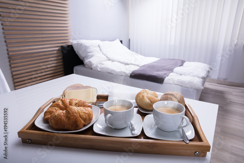 Croissants And Cup Of Tea In Tray