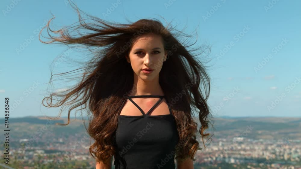 Wind blowing through a woman's hair