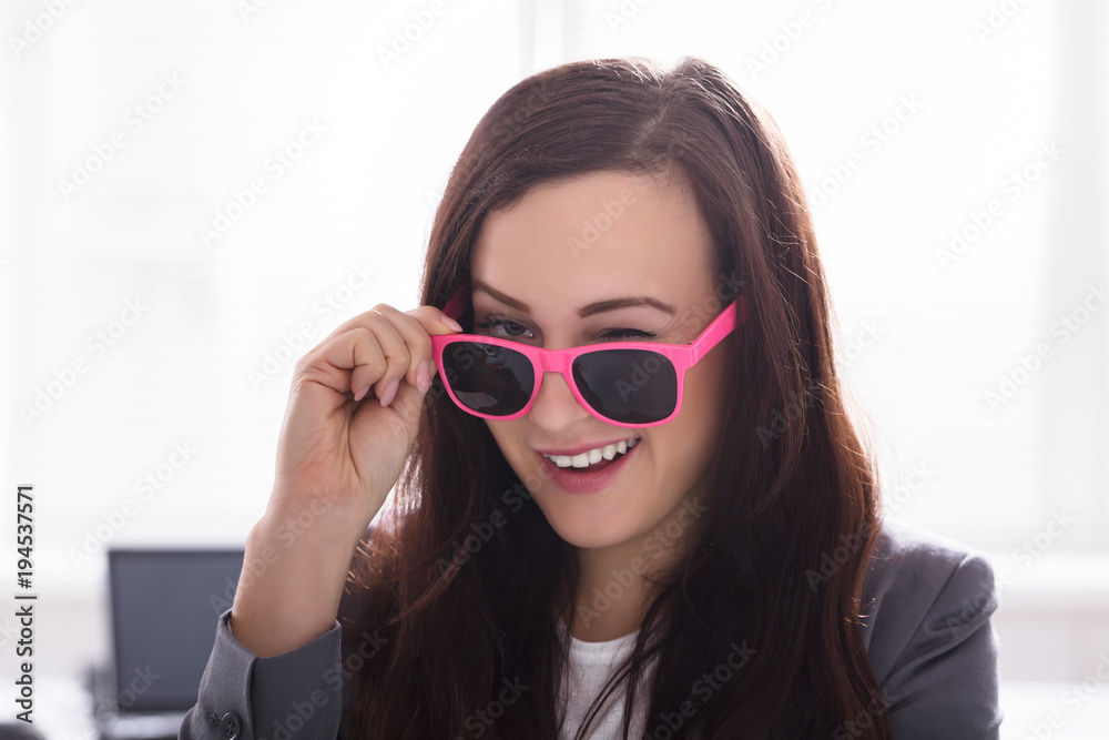 Businesswoman Wearing Pink Sunglasses Businesswoman Wearing Pink Sunglasses