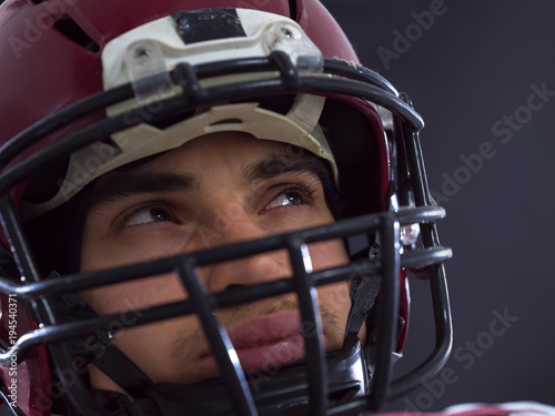 closeup American Football Player isolated on gray © .shock