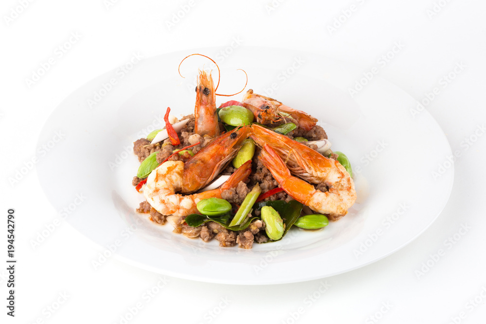 Stir-Fried Twisted Cluster Bean with Shrimps/Bitter Bean on white background. Stir-Fried Twisted Cluster Bean with Shrimps/Bitter Bean on white background.