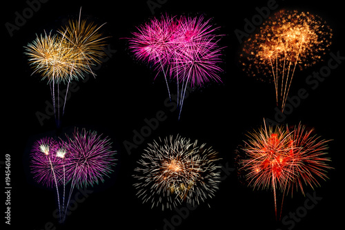 Festive patterned of Colorful assorted firework bursting in various shapes sparkling pictograms set against black background abstract