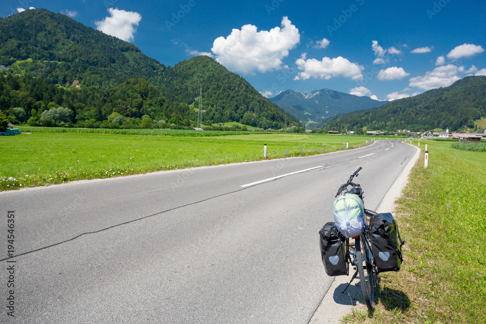 Touring bike on a road in Slovenia