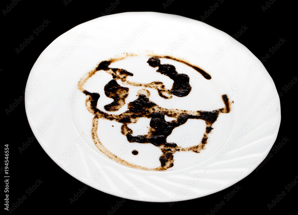 Fototapeta premium A cup of coffee on a black background