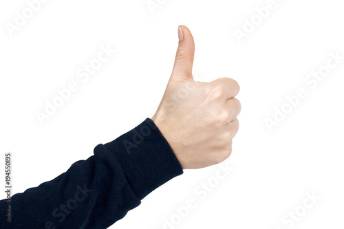 Female hand shows thumb up gesture and sign. Isolated on white background. Dark blue pullover