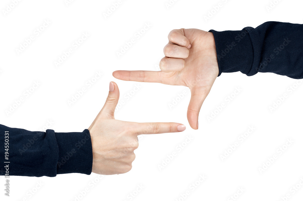 Female hand shows frame with fingers gesture and sign. Isolated on white background. Dark blue pullover