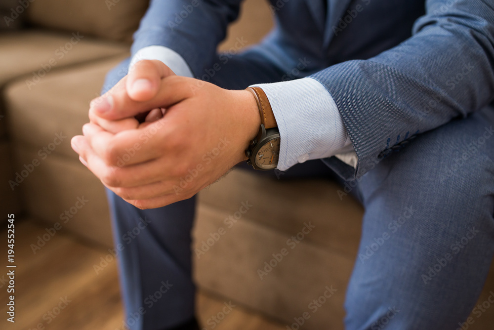Man's watch on hand. Classic men's accessories and style.