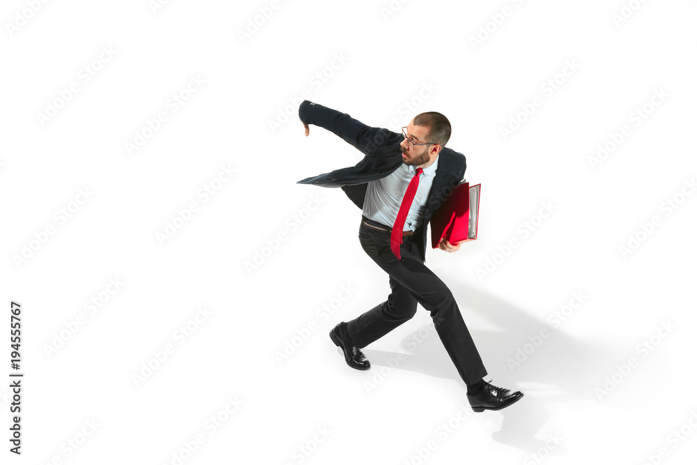 Businessman running with a folder on white background Businessman running with a folder on white background