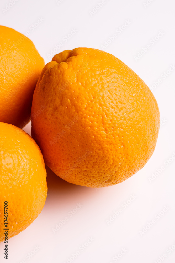 oranges and juice on a white background oranges and juice on a white background