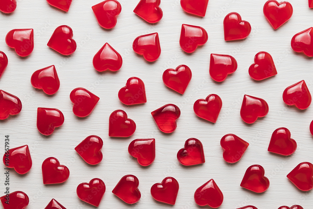 background of red hearts on a white wooden substrate background of red hearts on a white wooden substrate