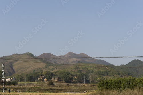 Houses next to the mountains