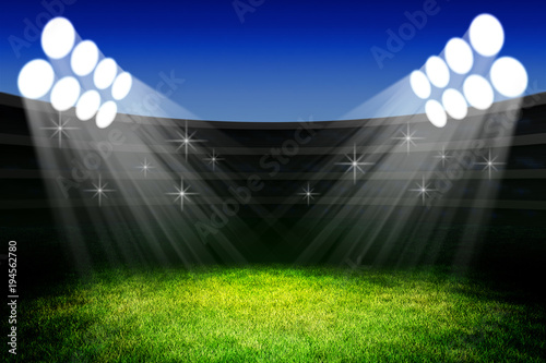 Sport event celebration ceremony concept, light of spotlights on the green grass field of the stadium arena