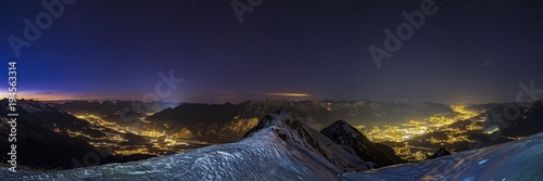 Inntal at dusk, Wetterstein mountains with Zugspitze on the left, Innsbruck with Nordkette on the right, Spitzmandl mountain in front, Tyrol, Austria, Europe