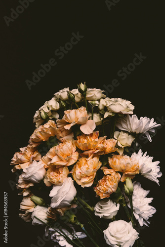close-up view of beautiful tender pink flower bouquet isolated on black