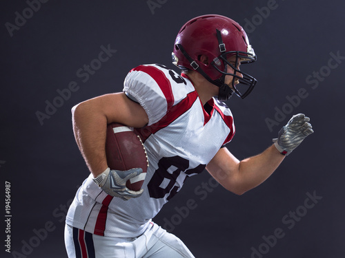 American football Player running with the ball