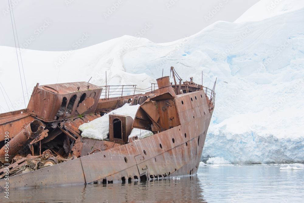 Old rusty wreck in Antarctic sea