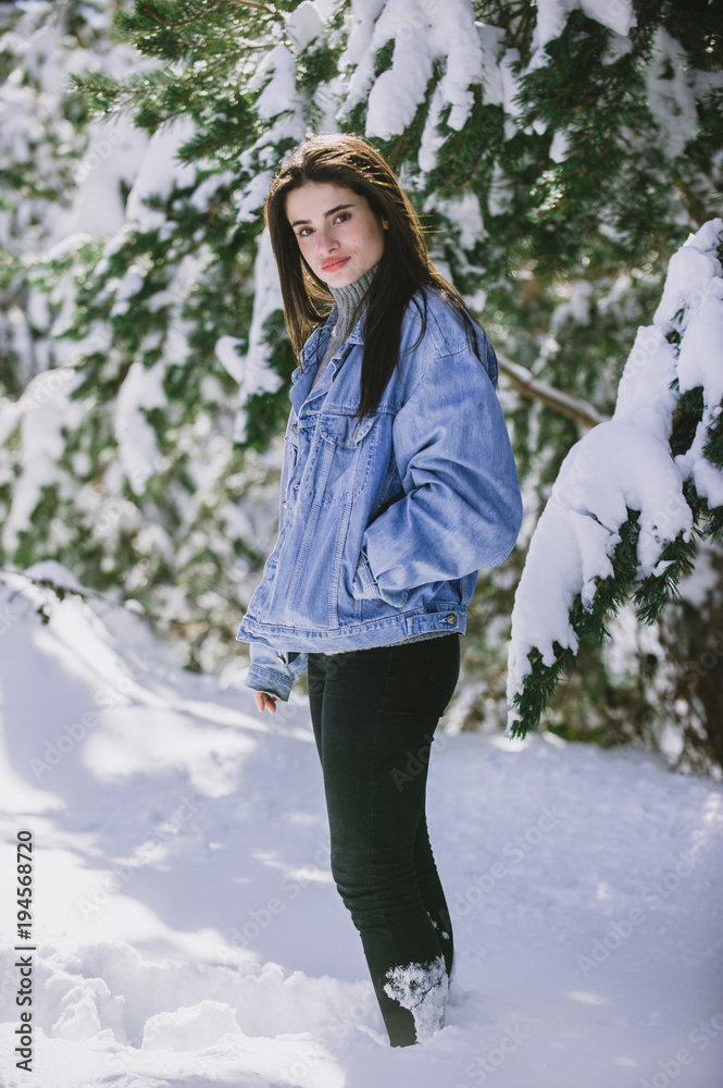 A beautiful woman in the snow A beautiful woman in the snow