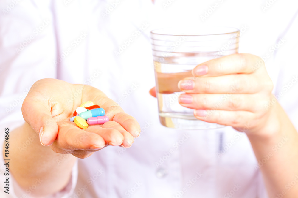 Tablet capsule hand doctor pharmacist white girl gown vitamin treatment.
Tablet capsule hand doctor pharmacist white girl gown vitamin treatment.