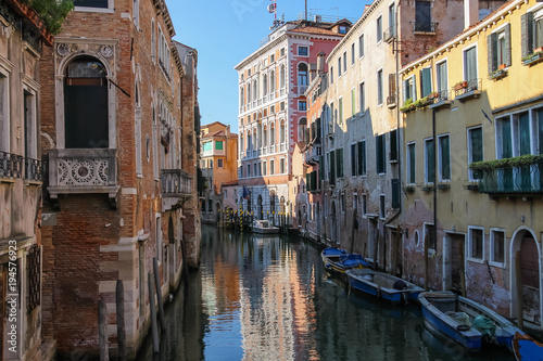 Narrow water street of historic center of Venice, Italy