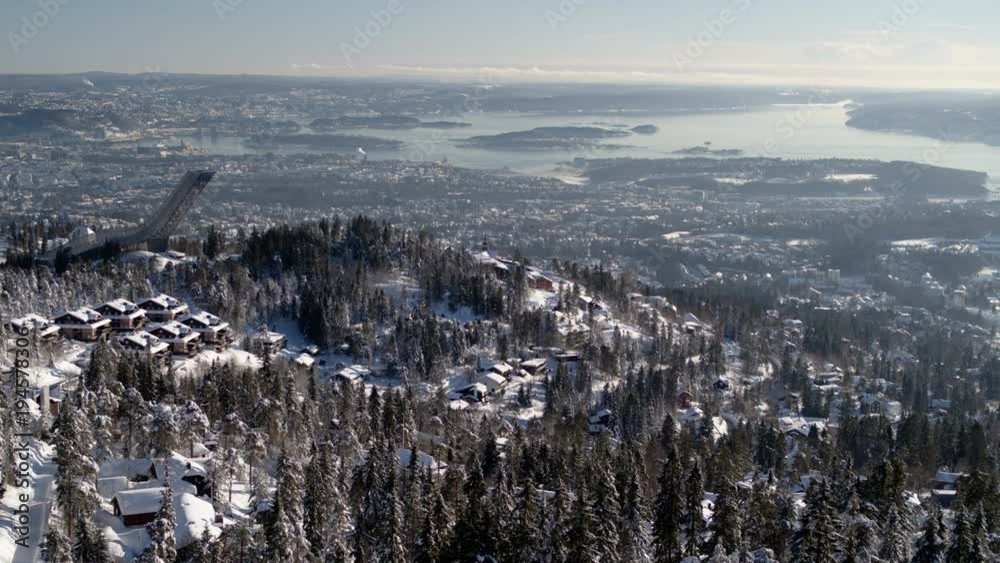 Drone shot behind Holmenkollen, view over Oslo, Norway, in Drone shot behind Holmenkollen, view over Oslo, Norway, in