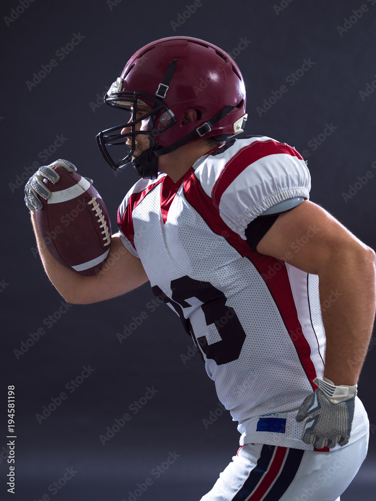 Fototapeta premium American football Player running with the ball