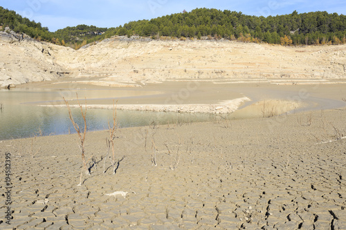 Empty lake at Bimont Dam near Aix en Provence, France. photo