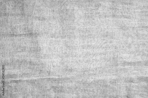 grey crumpled cloth textile texture background.