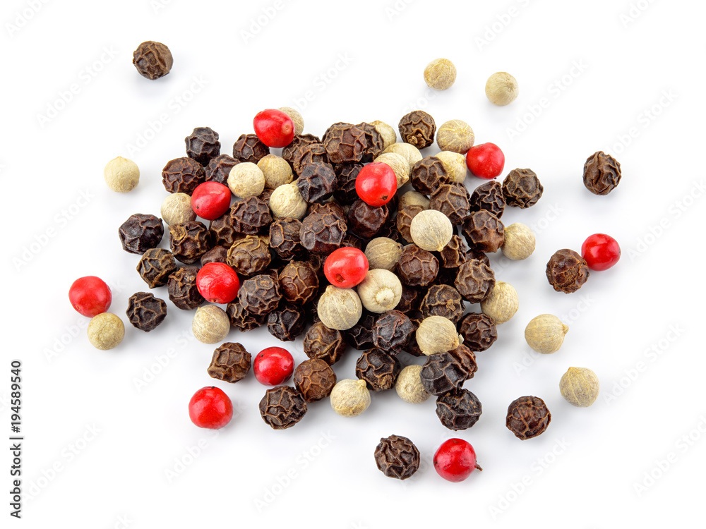 Black, red and white peppercorns isolated on white background. Heap of spice. Mix of different peppers. Full depth of field. Black, red and white peppercorns isolated on white background. Heap of spice. Mix of different peppers. Full depth of field.