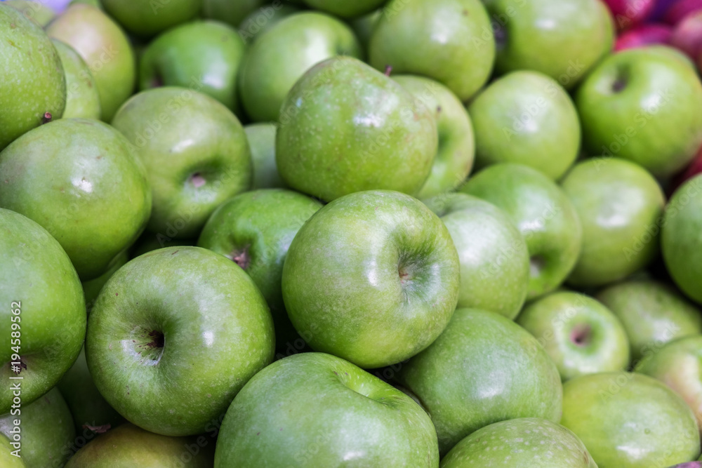 New green apples for sale at city market. New green apples for sale at city market.
