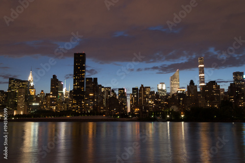 Skyline of the east side of midtown Manhattan at night © rmbarricarte