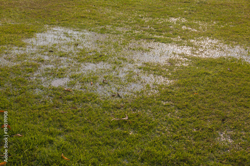 water on wet football field at thailand
