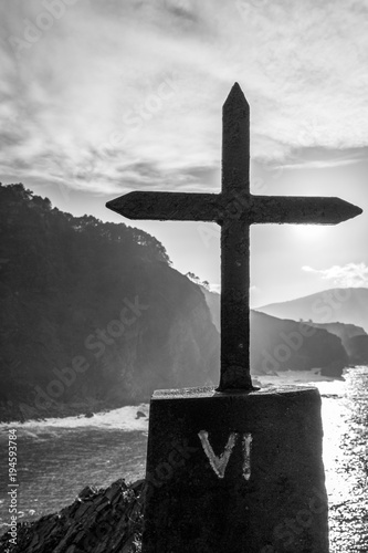 Crucifix covering the sun photo