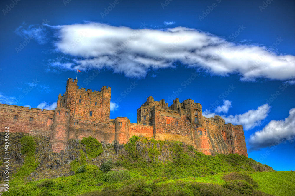 English medieval castle Bamburgh Northumberland north east England UK in colourful hdr