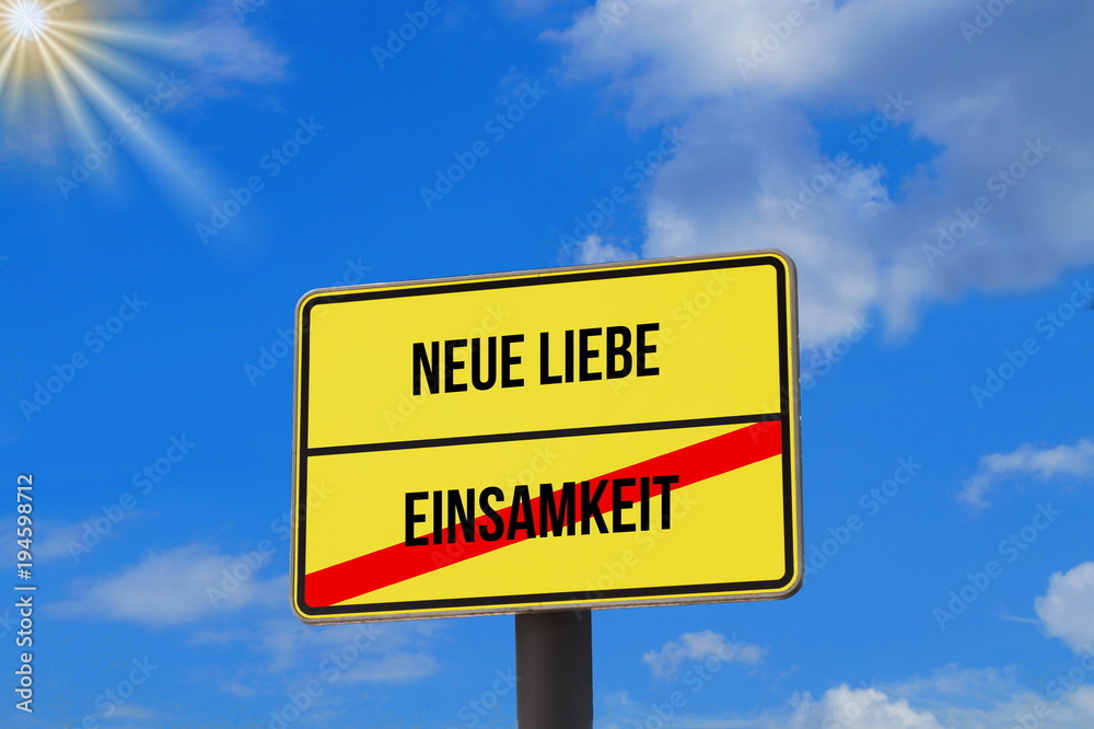 Eine Tafel mit dem Aufdruck Einsamkeit und Neue Liebe Eine Tafel mit dem Aufdruck Einsamkeit und Neue Liebe