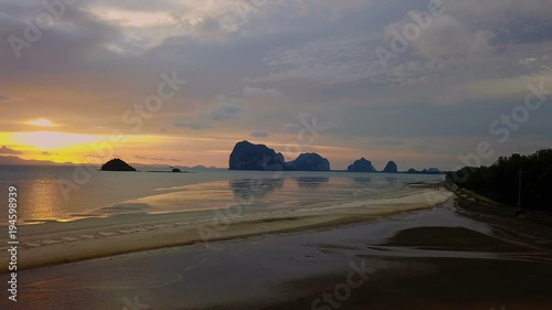 An unspoilt beach of Pak meng, Sikao District, Trang Province, Thailand. A natural beauty of crystal clear sea water, white sandy beach and distant islands located at Southern Thailand photo