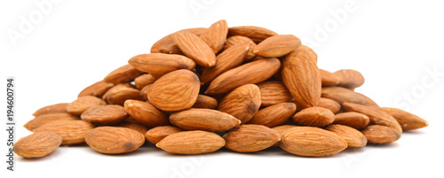 Foto Heap of almond nuts isolated on white background