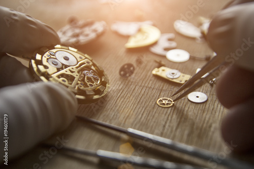 Process of installing a part on a mechanical watch, watch repair