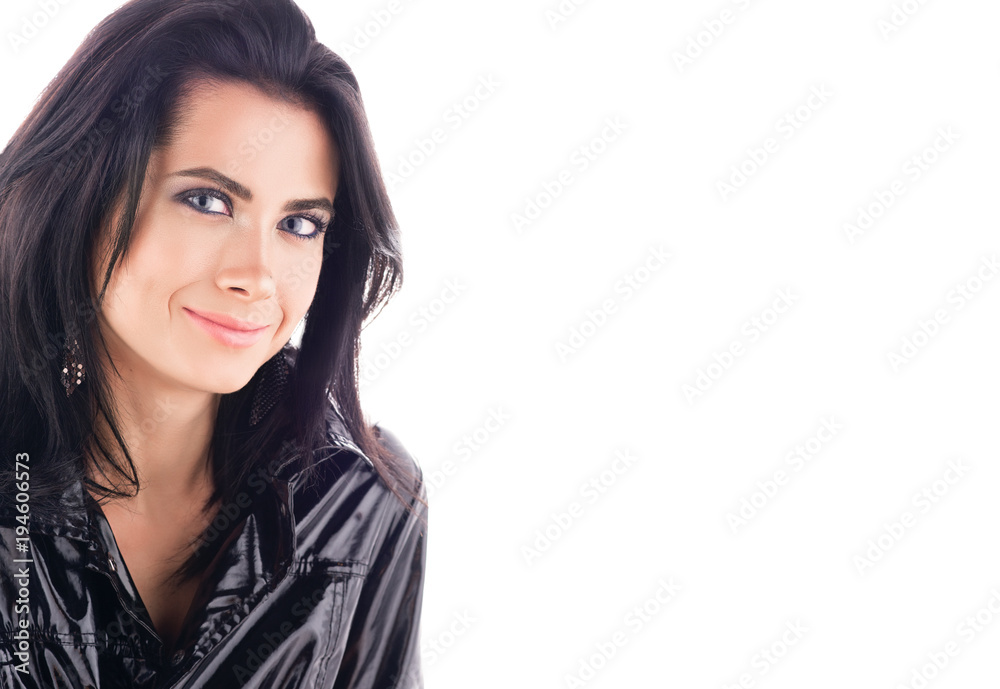 Portrait with free space. Young beautiful woman in a black glossy coat Portrait with free space. Young beautiful woman in a black glossy coat