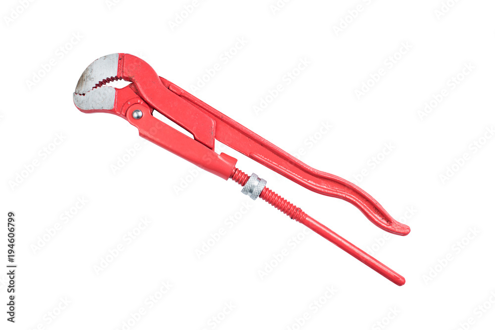 Adjustable red pipe wrench isolated on a white background, surface. Plumber's working tool, equipment Adjustable red pipe wrench isolated on a white background, surface. Plumber's working tool, equipment