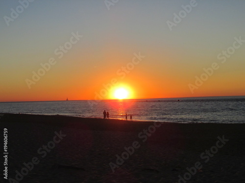 Sunset and fishermans photo