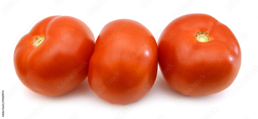 Closeup of tomatoes on the vine isolated on white Closeup of tomatoes on the vine isolated on white